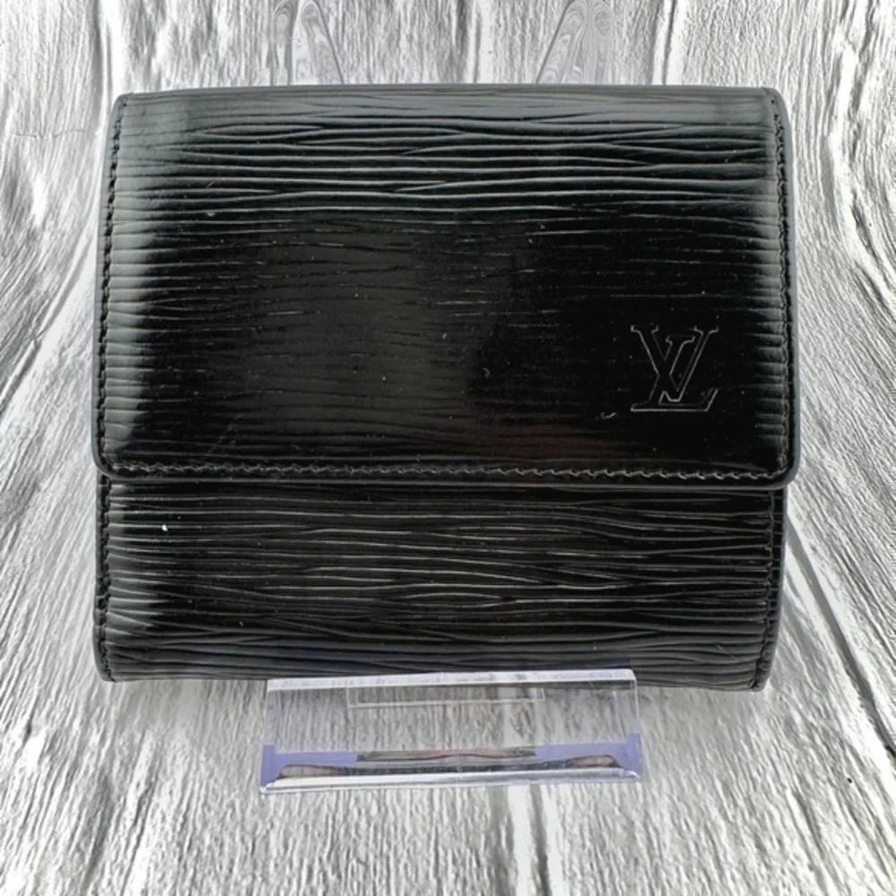 AUTHENTIC Louis Vuitton Marco Wallet. Previously owned. Black.